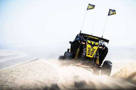 Doha, Qatar- February 23, 2018: Off road buggy car in the sand dunes of the Qatari desert.のeditorial素材
