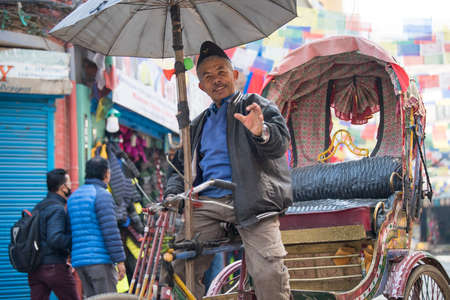 Kathmandu, Nepal - April 20,2019 : Cycle rickshaw on the streets of Kathmandu. In terai region of...