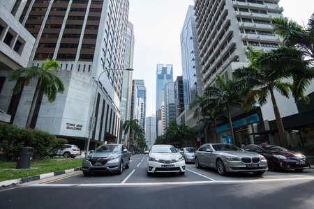 Singapore City,Singapore - May 01,2022: Low wide-angle view looking up to modern skyscrapers in business district of Singapore City.のeditorial素材