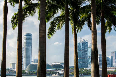 Singapore City,Singapore - May 01,2022: Low wide-angle view looking up to modern skyscrapers in business district of Singapore City.のeditorial素材