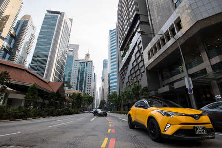 Singapore City,Singapore - May 01,2022: Low wide-angle view looking up to modern skyscrapers in business district of Singapore City.のeditorial素材