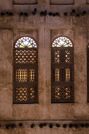 Doha, Qatar, April 22,2022: Night views of the traditional Arabic architecture of Souq Waqif Market.