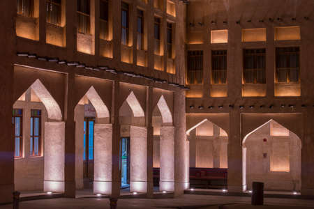 Doha, Qatar, April 22,2022: Night views of the traditional Arabic architecture of Souq Waqif Market.