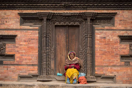 Kathmandu, Nepal- April 20,2019 : Portrait of older Nepalese in Patan Durbar Square.のeditorial素材