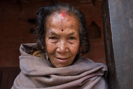 Kathmandu, Nepal- April 20,2019 : Portrait of older Nepalese in Patan Durbar Square.のeditorial素材