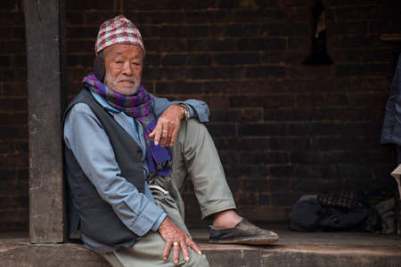 Kathmandu, Nepal- April 20,2019 : Portrait of older Nepalese in Patan Durbar Square.のeditorial素材