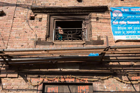 Kathmandu, Nepal- April 20,2019 : Portrait of older Nepalese in Patan Durbar Square.のeditorial素材