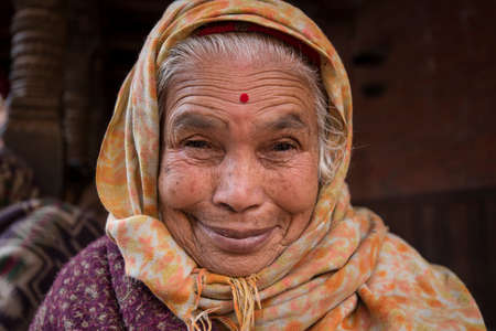 Kathmandu, Nepal- April 20,2019 : Portrait of older Nepalese in Patan Durbar Square.のeditorial素材