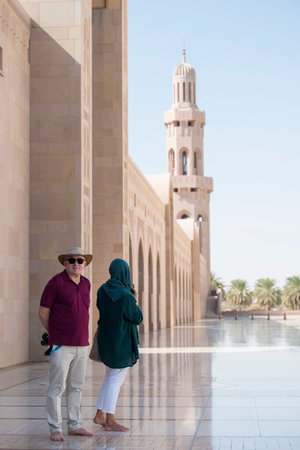 Muscat, Oman - March 05,2019 : Tourists tour in the Sultan Qaboos Grand Mosque.のeditorial素材
