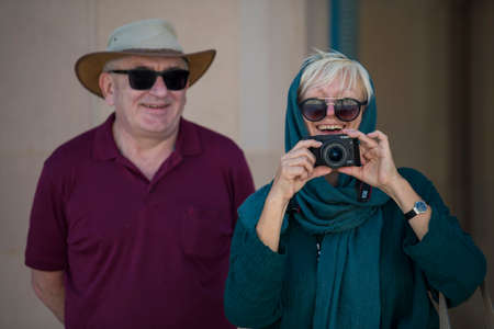 Muscat, Oman - March 05,2019 : Tourists tour in the Sultan Qaboos Grand Mosque.のeditorial素材