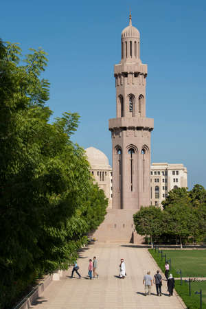 Muscat, Oman - March 05,2019 : Tourists tour in the Sultan Qaboos Grand Mosque.のeditorial素材