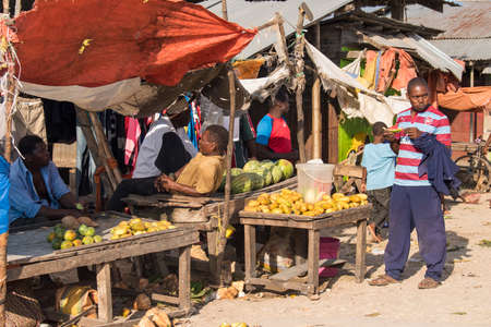 Zanzibar City, Tanzania - May 01,2022: Street view of the usual daily life of local people all ages taking place along the road on the Zanzibar Island in Tanzania.のeditorial素材