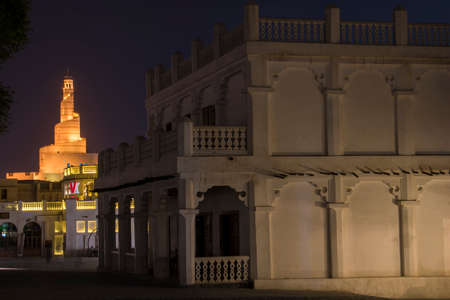 Doha, Qatar, April 22,2022: Night views of the traditional Arabic mosque architecture of Souq Waqif...