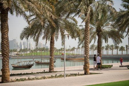 Doha,Qatar - March 05, 2019 : People enjoying a sunny day in the park of the Museum of Islamic Art...