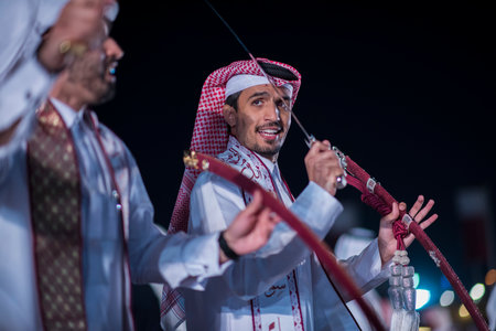 Doha,Qatar,December-18,2017: The sword dance called the ardha at the Darb Al Saai grounds, organized...