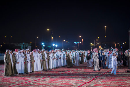 Doha,Qatar,December-18,2017: The sword dance called the "ardha" at the Darb Al Saai grounds, organized to celebrate Qatar National Day.のeditorial素材