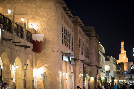 Doha, Qatar, May 5,2022: Traditional Arabian building built of wood and mud decorated with a facade...