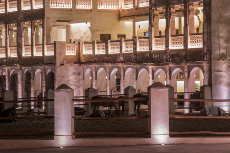 Doha, Qatar, May 5,2022: Traditional Arabian building built of wood and mud decorated with a facade in the traditional Arabic style.のeditorial素材