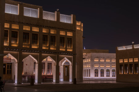 Doha, Qatar, May 5,2022: Traditional Arabian building built of wood and mud decorated with a facade in the traditional Arabic style.のeditorial素材
