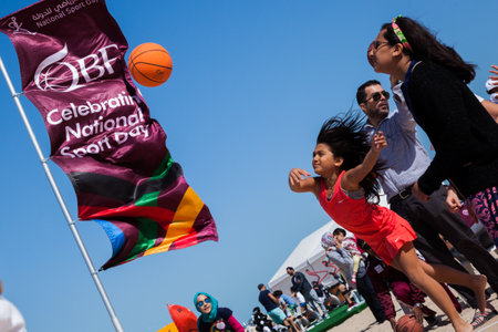 Doha ,Qatar-February 14,2016 : Local people enjoy basketball at an event organized for the...