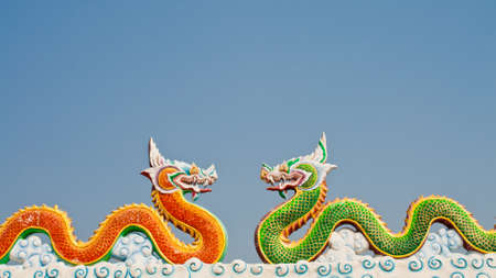 Serpent statue and blue sky
