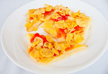 Bread and cereal with strawberry jam
