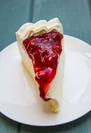 Strawberry cake on white plateの写真素材