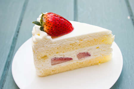 Strawberry cake on white plateの写真素材
