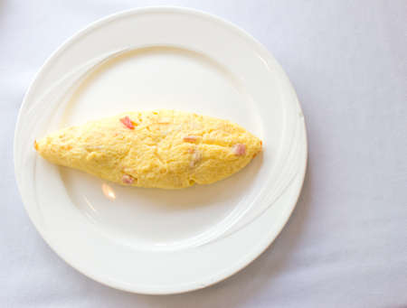 Egg roll on white plate backgroundの写真素材