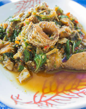 Stir fried fish meat is spicy thai foodの写真素材