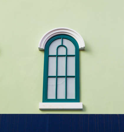 Vintage windows on Green wallの写真素材