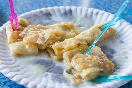 Dessert style of fried Roti with bananaの写真素材