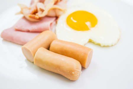 Breakfast style sausage and bacon with hamの写真素材