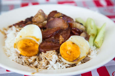 Rice with roasted pork  in the dishの写真素材