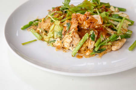 Fried pork sukiyaki on white dishの写真素材