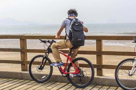 Youngster riding on a bicycle のeditorial素材