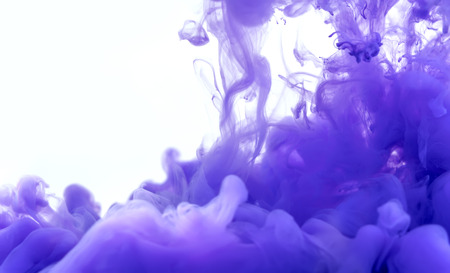 Purple color ink on white backgroundの写真素材