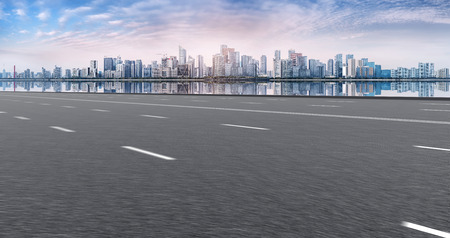 View of the skyline of Hangzhou urban architectural landscape the asphalt roadの写真素材