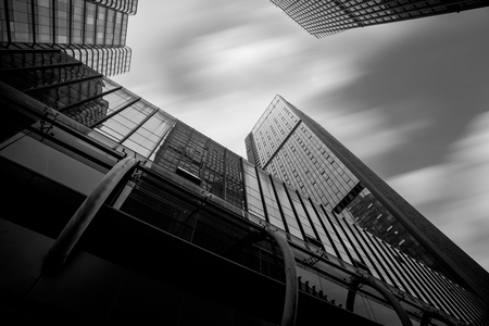 Low angle view of urban buildings in the cityのeditorial素材
