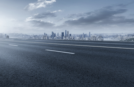Prospects for expressway, asphalt pavement, city commercial buildingsの写真素材
