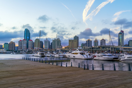 Qingdao Cruise Ship Terminal and City Buildingの写真素材