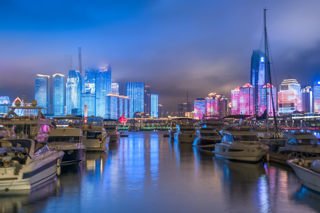 Qingdao Cruise Ship Terminal and City Building Night Sceneの写真素材