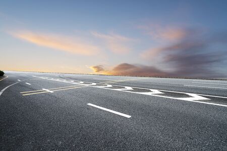 Road traffic and sky clouds