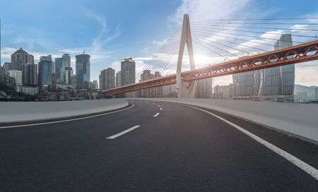Road pavement and Chongqing urban architecture skylineの写真素材