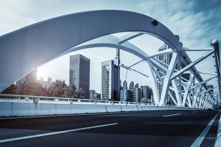 Blue tone urban road bridge structureの写真素材