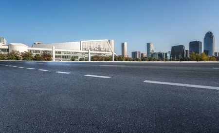 Road and city building skyscrapersの写真素材