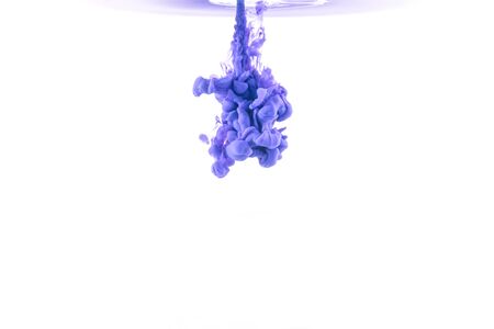 Ink in water isolated on white background.の写真素材