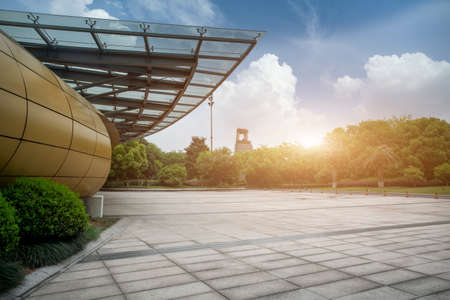 Square floor tiles and modern architectural landscapeの写真素材