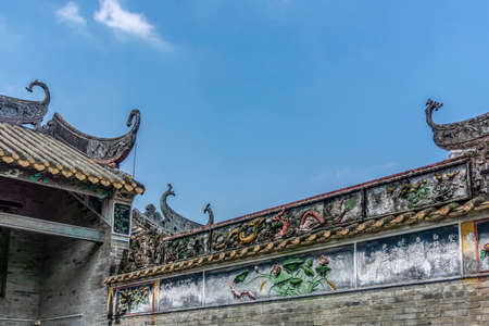 Guangzhou, China-September 17, 2019: Traditional Chinese shops and buildings in Lingnan Impression...
