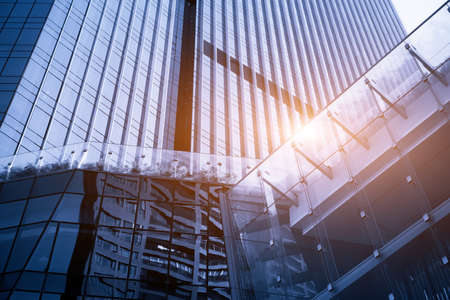 Top view of urban skyscrapers in blue tones